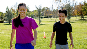 Invisalign Photo Teens playing Soccer