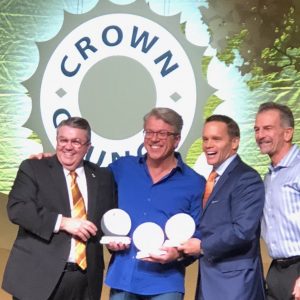 Dr. Edward White of White Family Dental receiving an award from the Crown Council